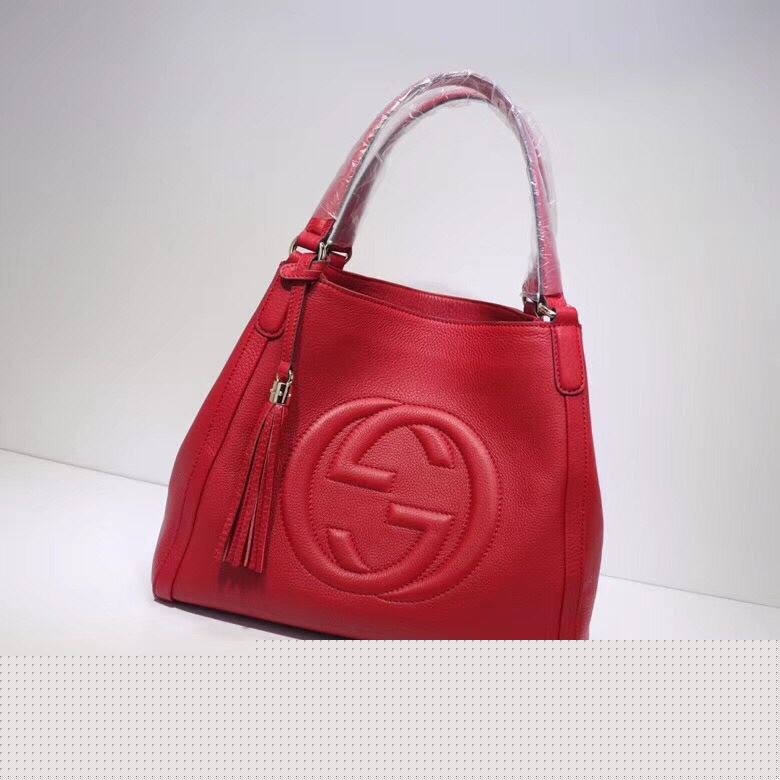 G*u*i top handle bags